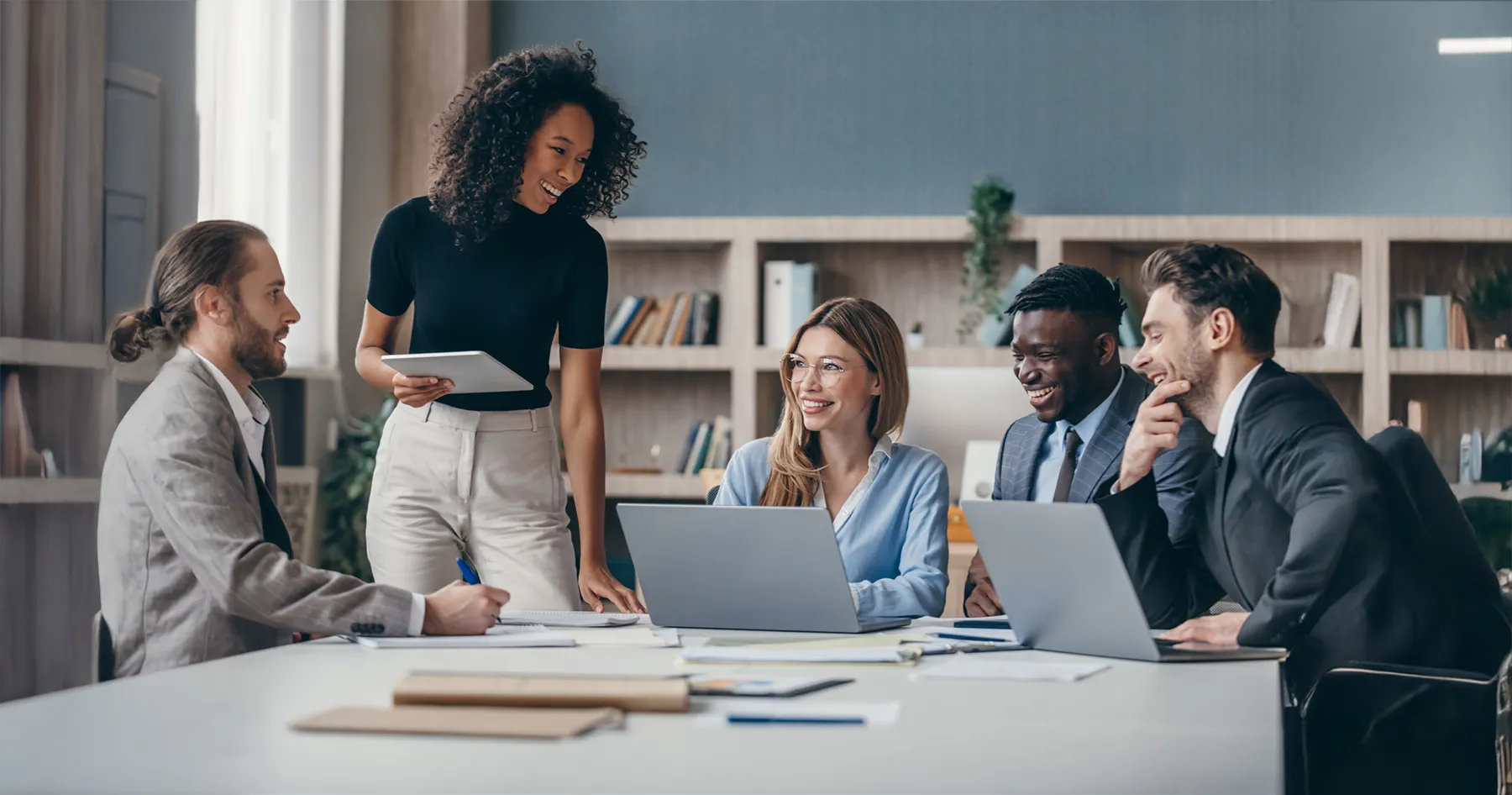 Diverse team collaborating in a modern office.